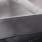 Chanel Embossed Logo · Lambskin