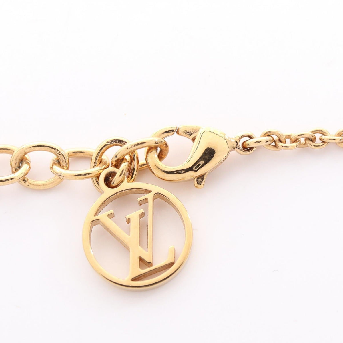 Louis Vuitton Essential V · Gold Plated