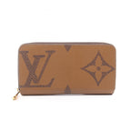 Louis Vuitton Zippy · Monogram Giant Reverse