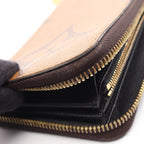 Louis Vuitton Zippy · Monogram Giant Reverse