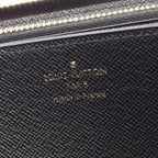 Louis Vuitton Zippy · Monogram Giant Reverse