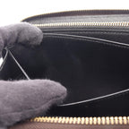 Louis Vuitton Zippy · Monogram Giant Reverse