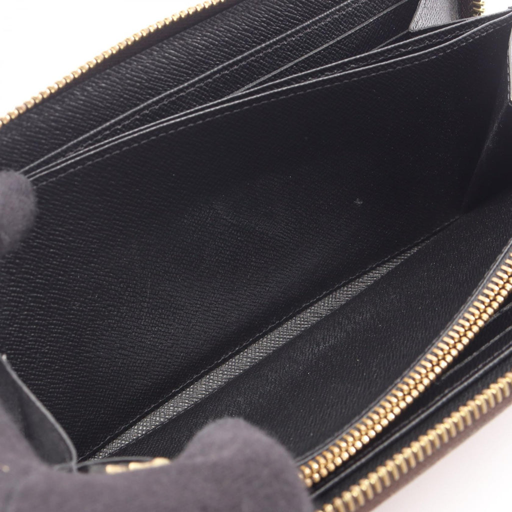 Louis Vuitton Zippy · Monogram Giant Reverse