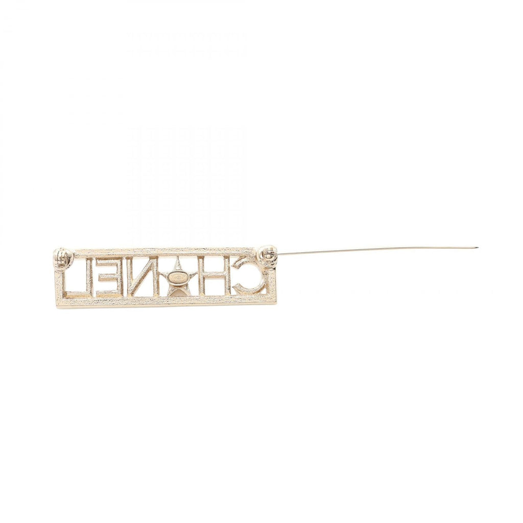 CHANEL Logo Brooch · Crystal Pavé