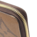 Louis Vuitton Zippy · Monogram Giant Reverse