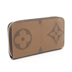 Louis Vuitton Zippy · Monogram Giant Reverse