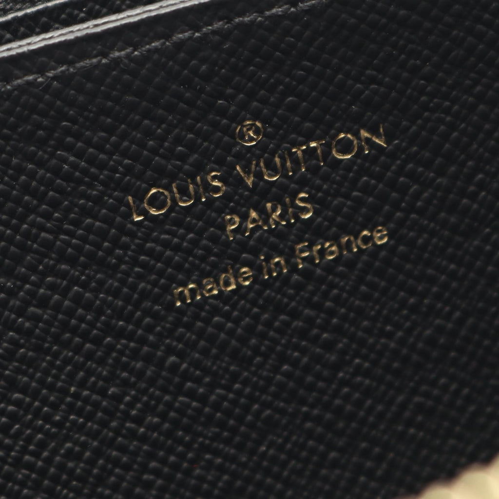 Louis Vuitton Zippy · Monogram Giant Reverse