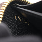 Louis Vuitton Zippy · Monogram Giant Reverse