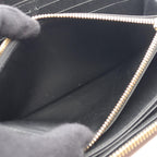 Louis Vuitton Zippy · Monogram Giant Reverse