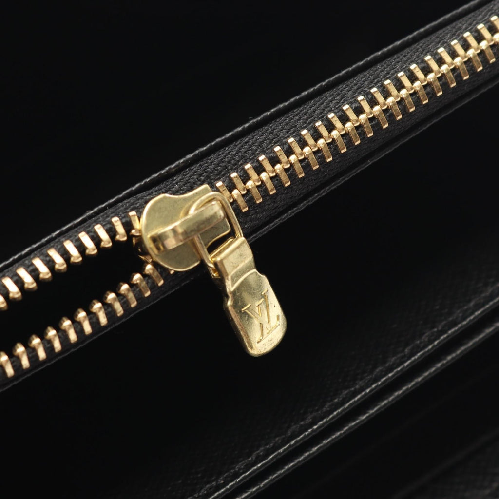 Louis Vuitton Zippy · Monogram Giant Reverse