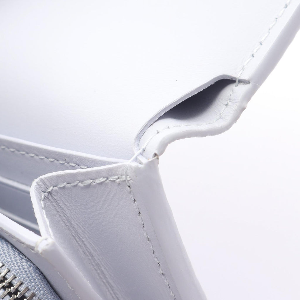 Louis Vuitton Capucines · Leather Wallet