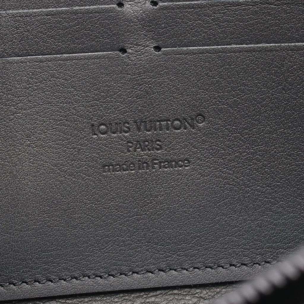 LOUIS VUITTON Zippy · Taurillon Noir
