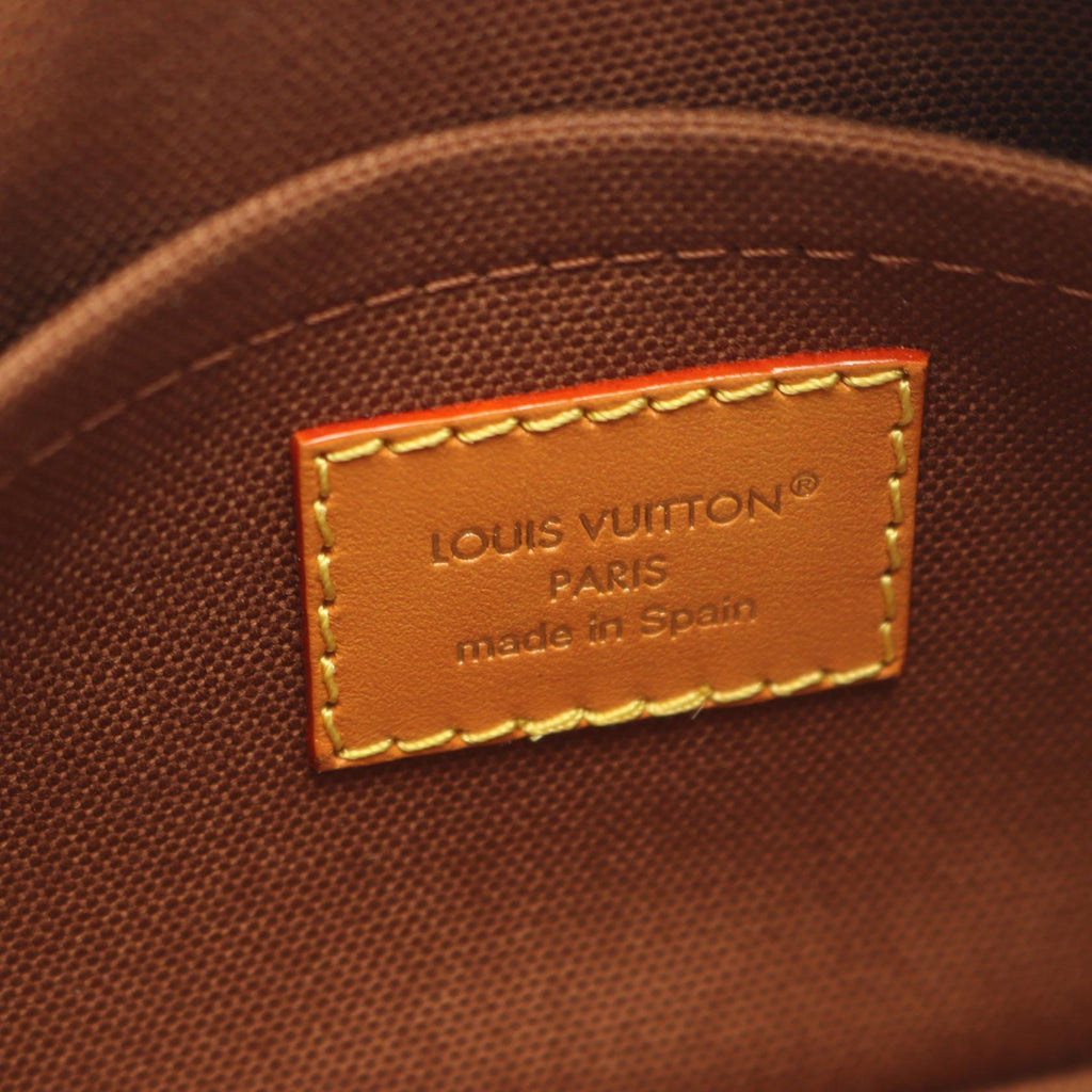 Louis Vuitton Trocadero · Monogram Canvas