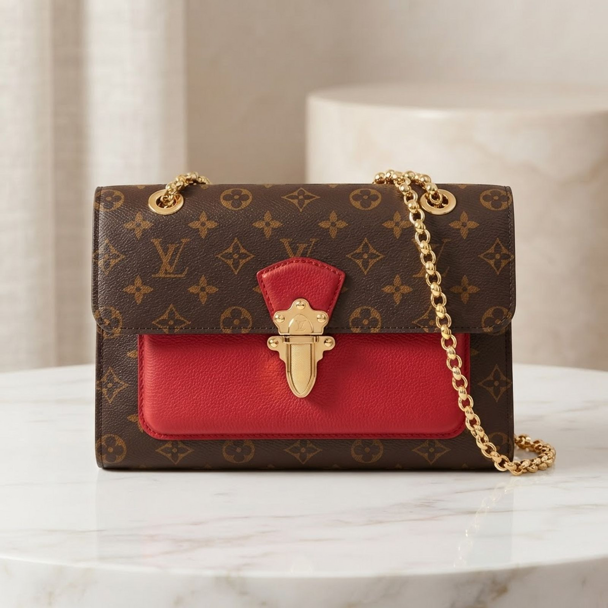 Louis Vuitton Victoire · Monogram Canvas