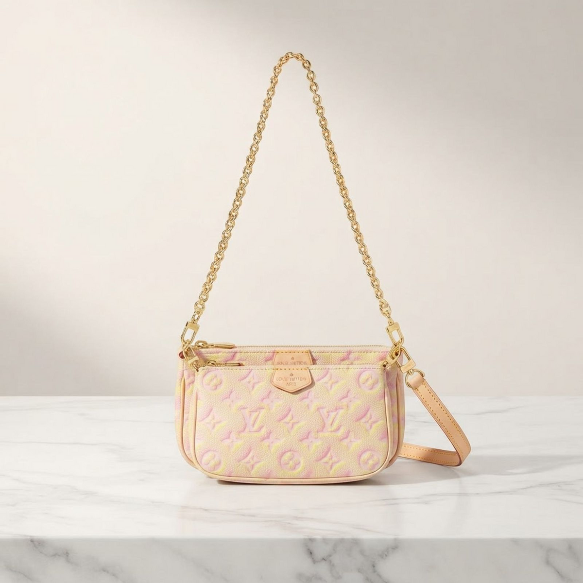 Louis Vuitton Pochette · Monogram Empreinte