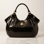 Louis Vuitton Surya L · Mahina Patent
