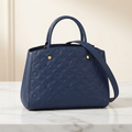 Louis Vuitton Montaigne MM · Monogram Empreinte