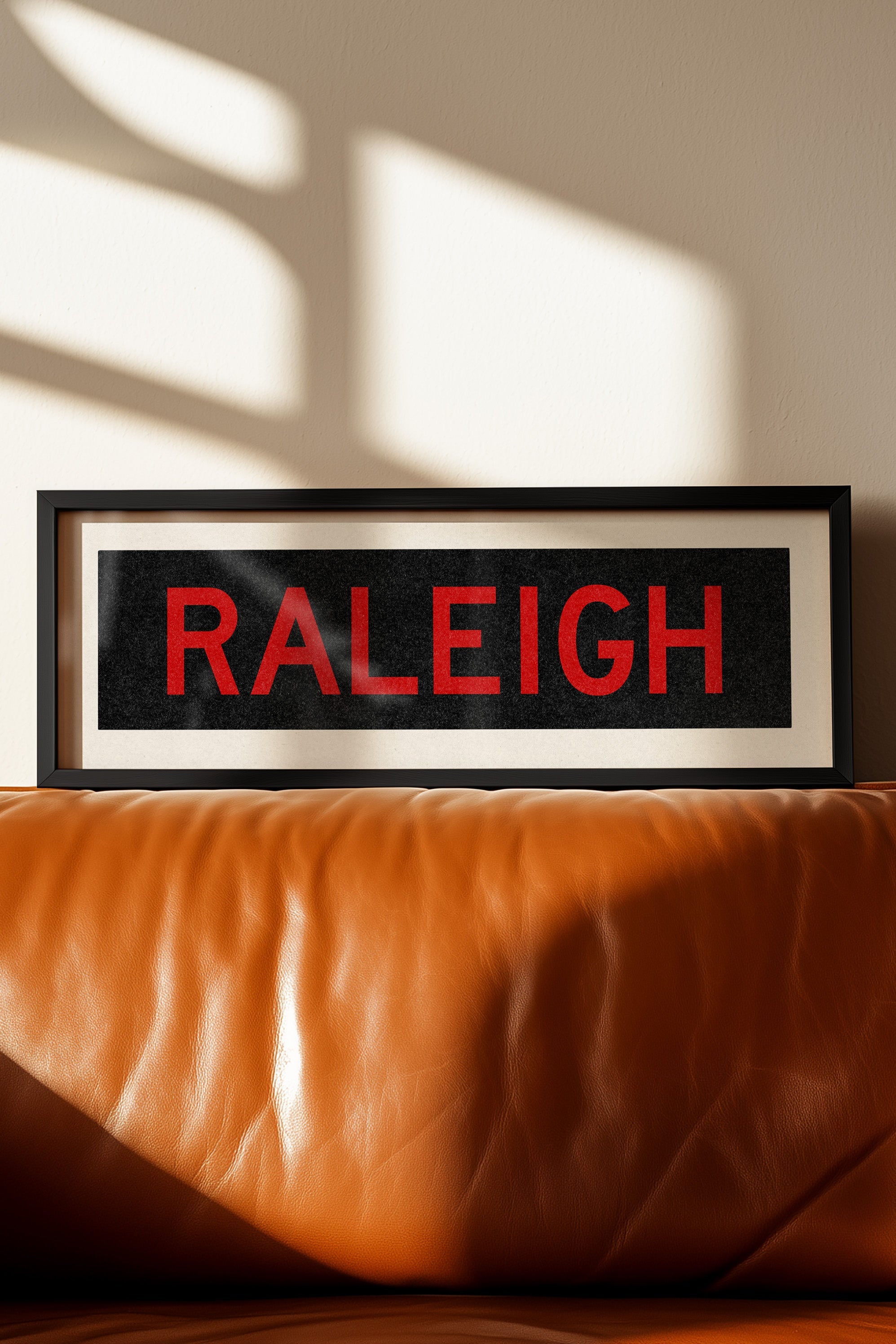 Framed Raleigh Red and Black Bus Scroll