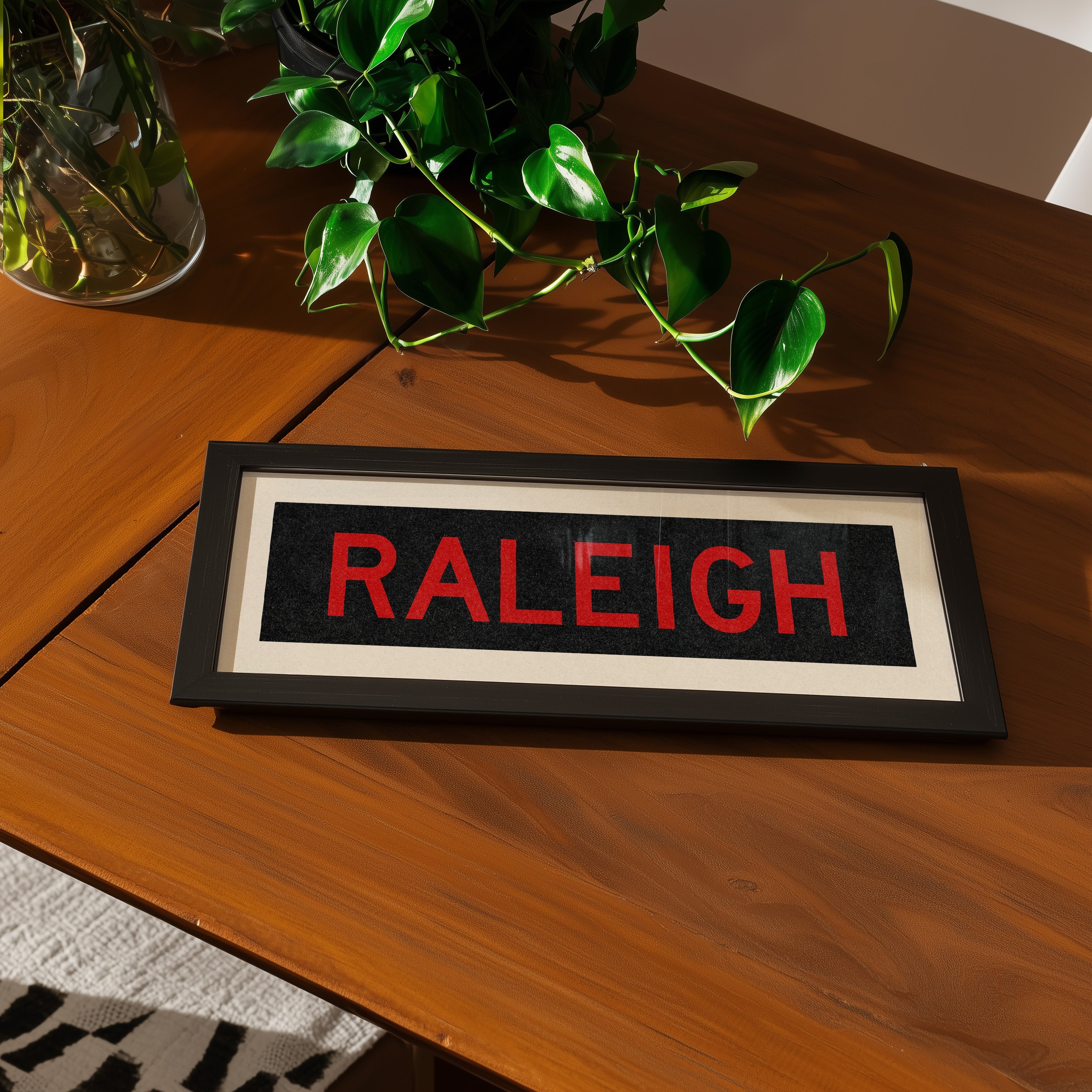 Framed Raleigh Red and Black Bus Scroll