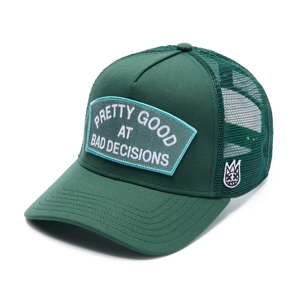 Cult's Mesh Trucker Hat "Good At Bad Decisions" In Bayberry