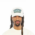 Cult's Mesh Back Trucker Hat "Pretty Good At Bad Decisions" In Winter White