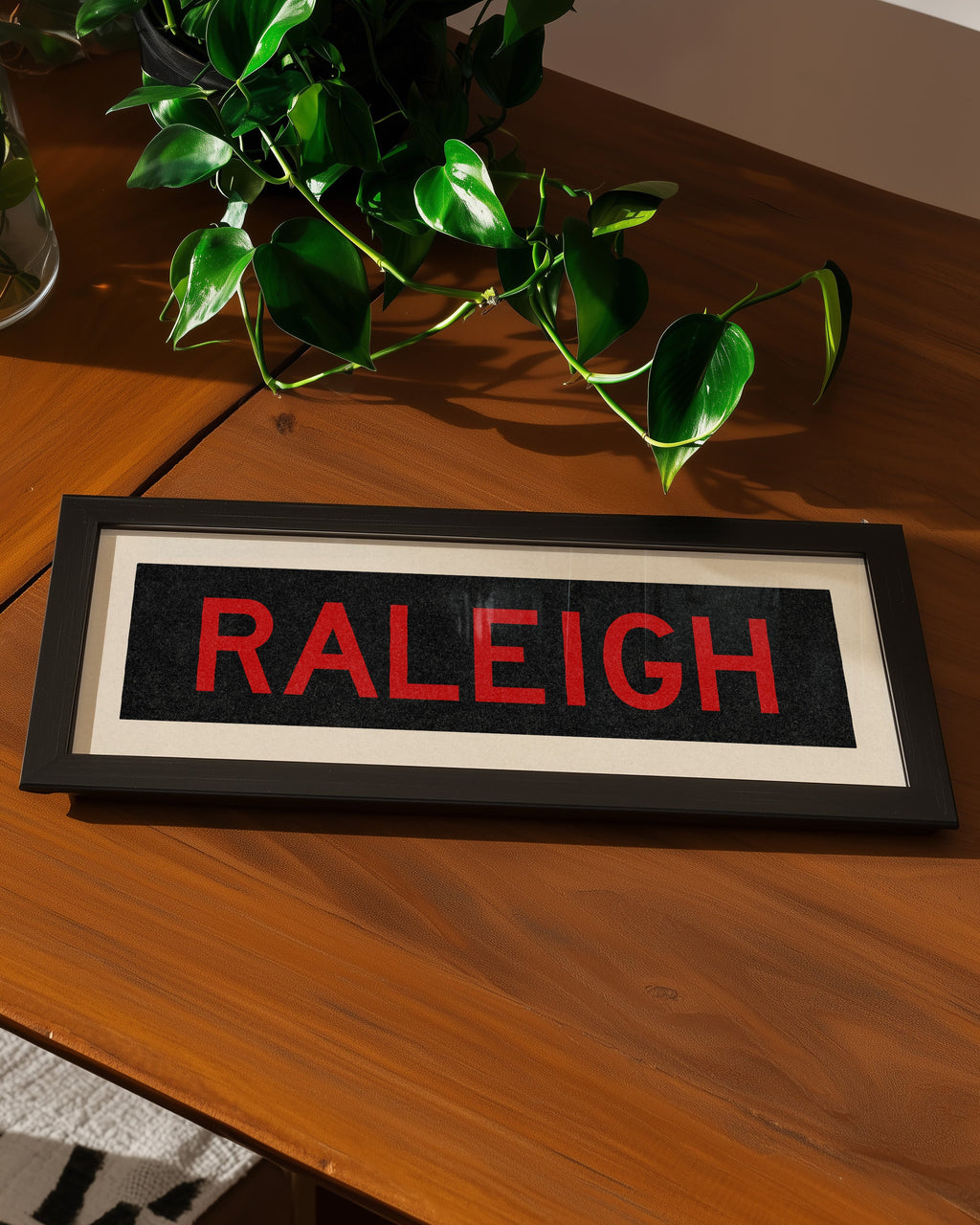 Framed Raleigh Red and Black Bus Scroll