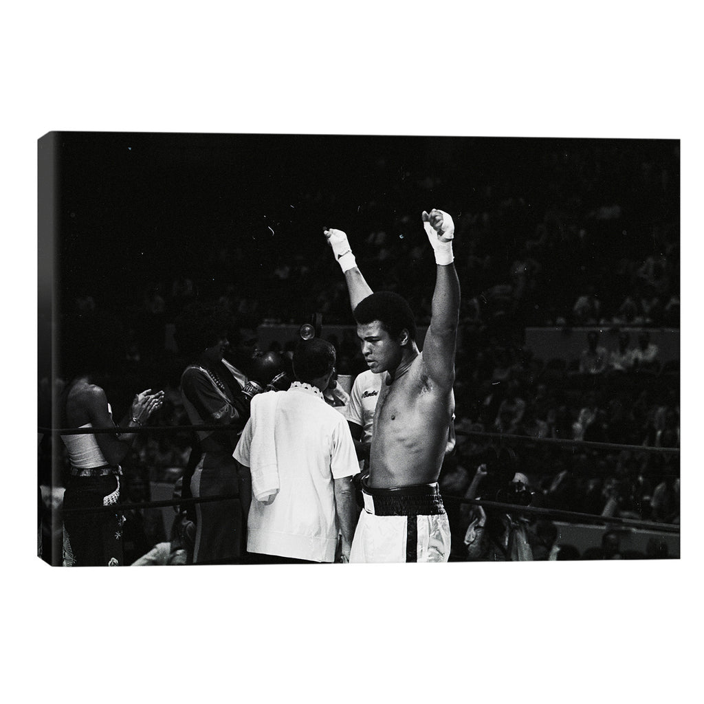 Muhammad Ali With Hands Raised // Muhammad Ali Enterprises