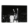Muhammad Ali With Hands Raised // Muhammad Ali Enterprises