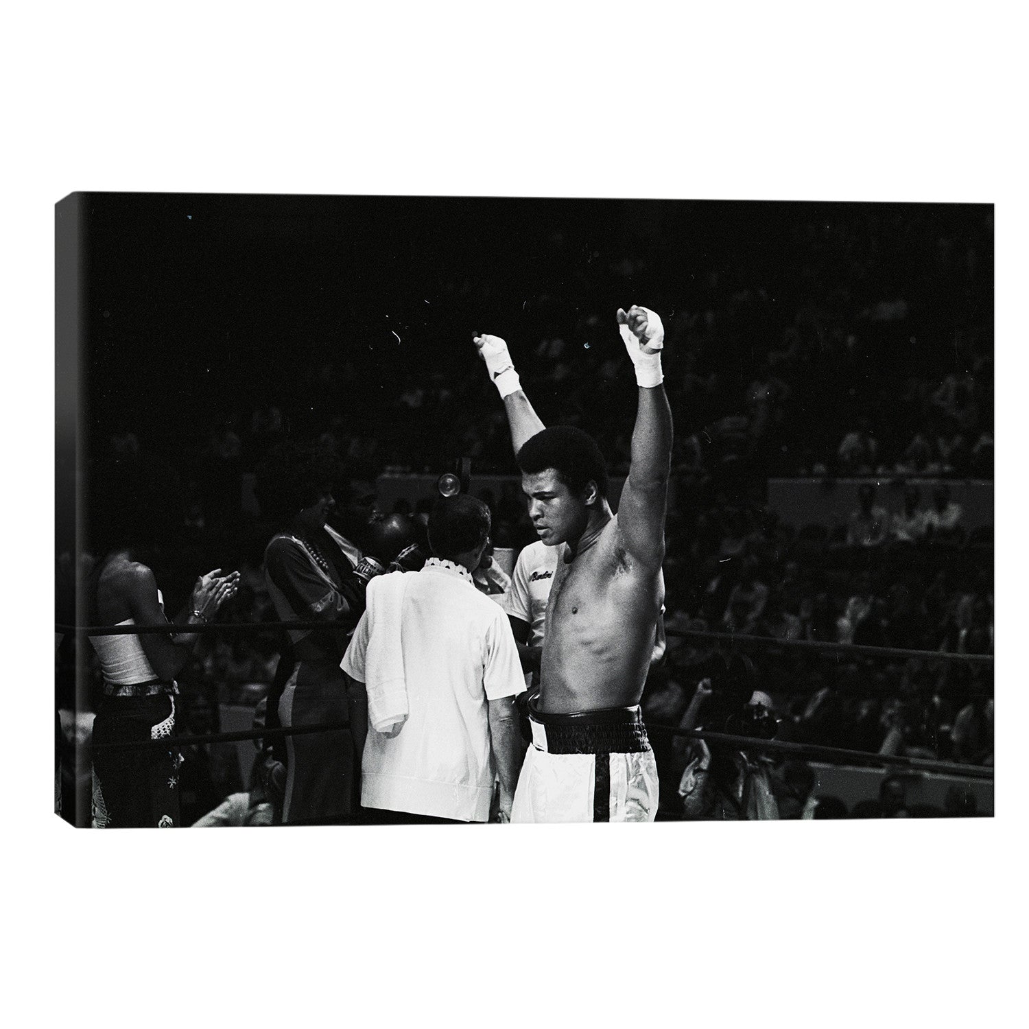 Muhammad Ali With Hands Raised // Muhammad Ali Enterprises