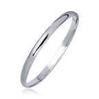14k White Gold Dome Children's Bangle with a Polished Finish
