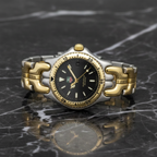 Tag Heuer Sel Professional · Steel & Gold