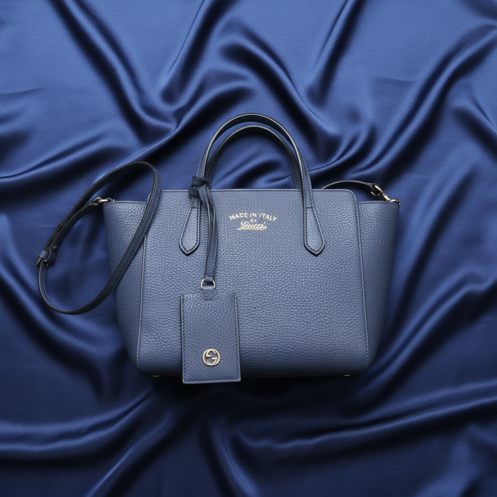 Gucci Swing · Leather