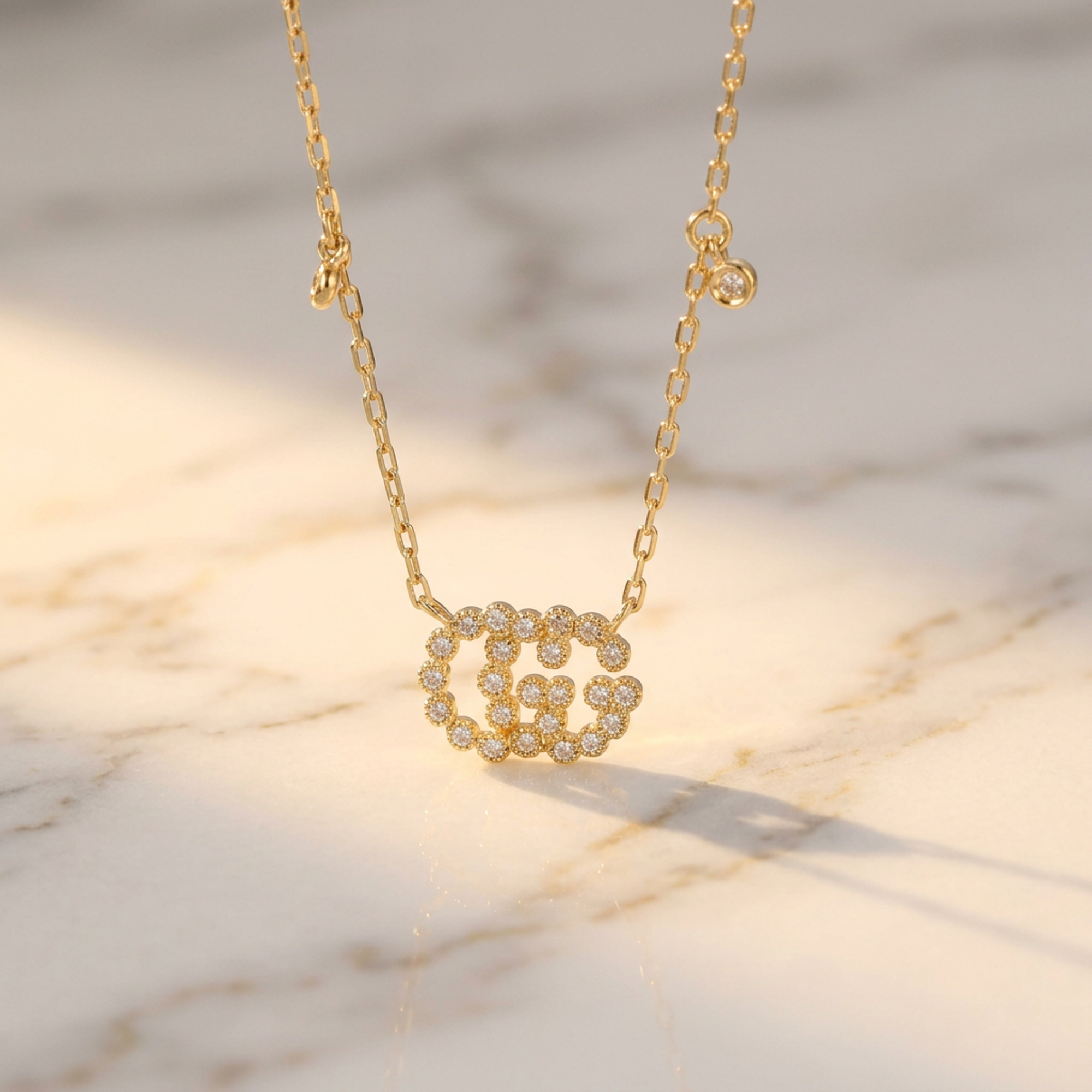 Gucci GG Logo · Diamond · 18K Yellow Gold