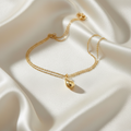 Tiffany Teardrop · 18K Yellow Gold