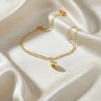 Tiffany Teardrop · 18K Yellow Gold