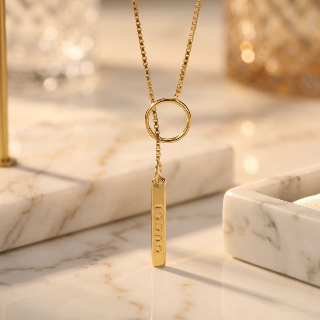 Gucci Lariat · 18K Yellow Gold