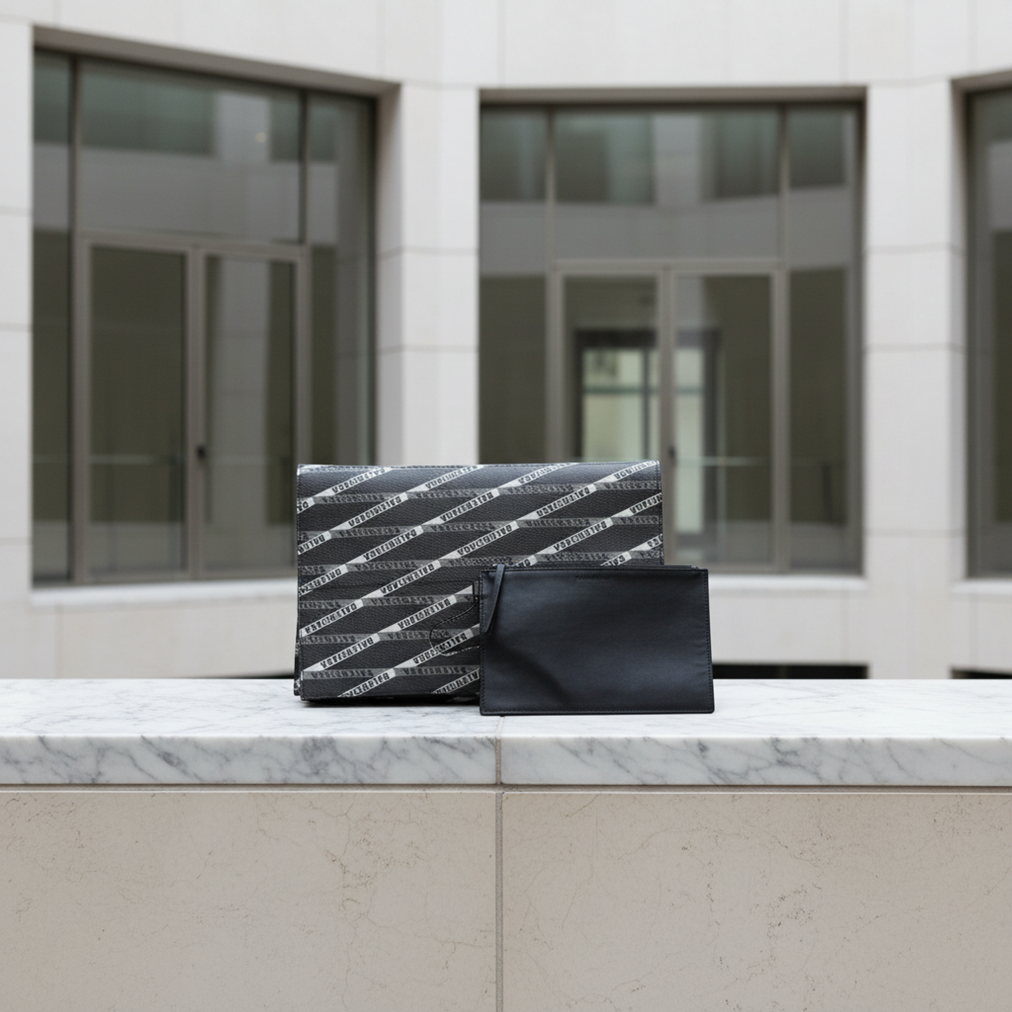 Balenciaga Logo Print · Leather Clutch