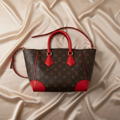 Louis Vuitton Phoenix PM · Monogram Coquelicot