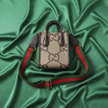 Gucci Jumbo GG Mini · Canvas
