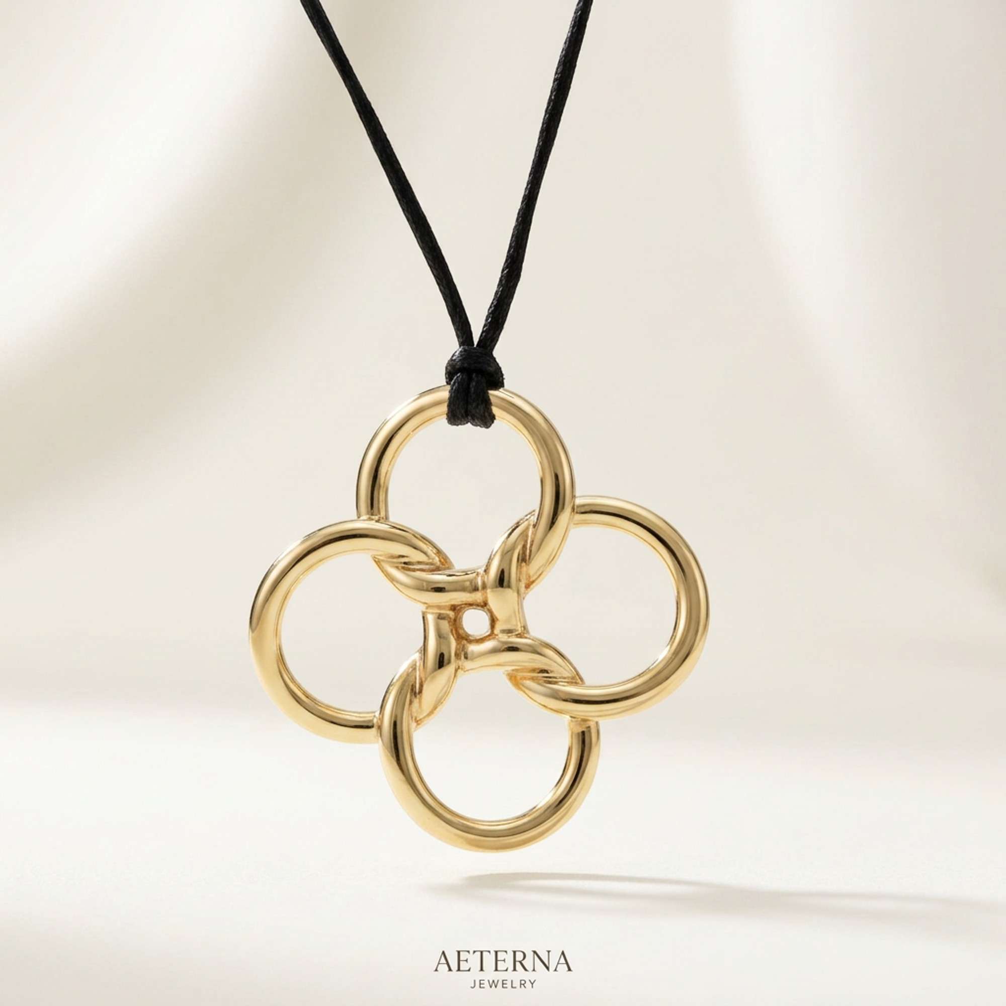 Tiffany Quadrofolio Cord · 18K Yellow Gold