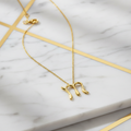 Tiffany Letter M · 18K Yellow Gold