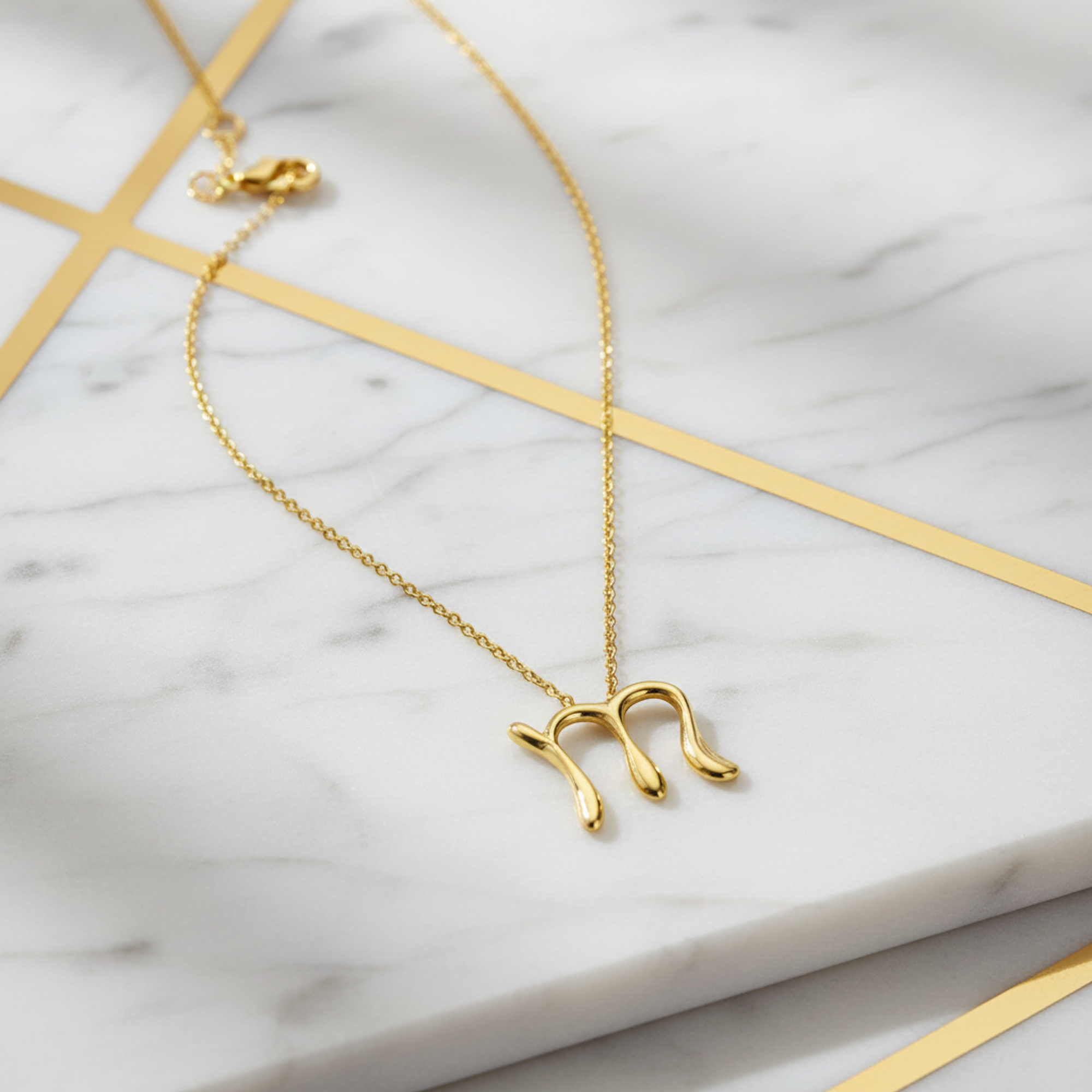 Tiffany Letter M · 18K Yellow Gold