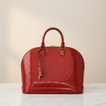 Louis Vuitton Alma GM · Monogram Vernis
