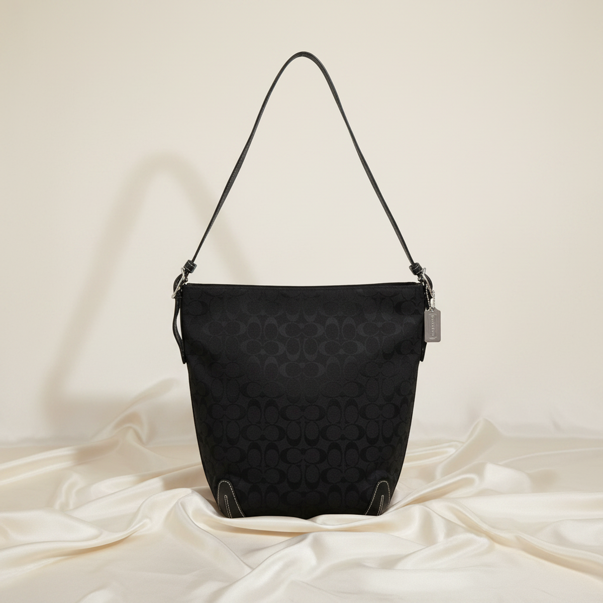 Coach Signature · Canvas & Leather