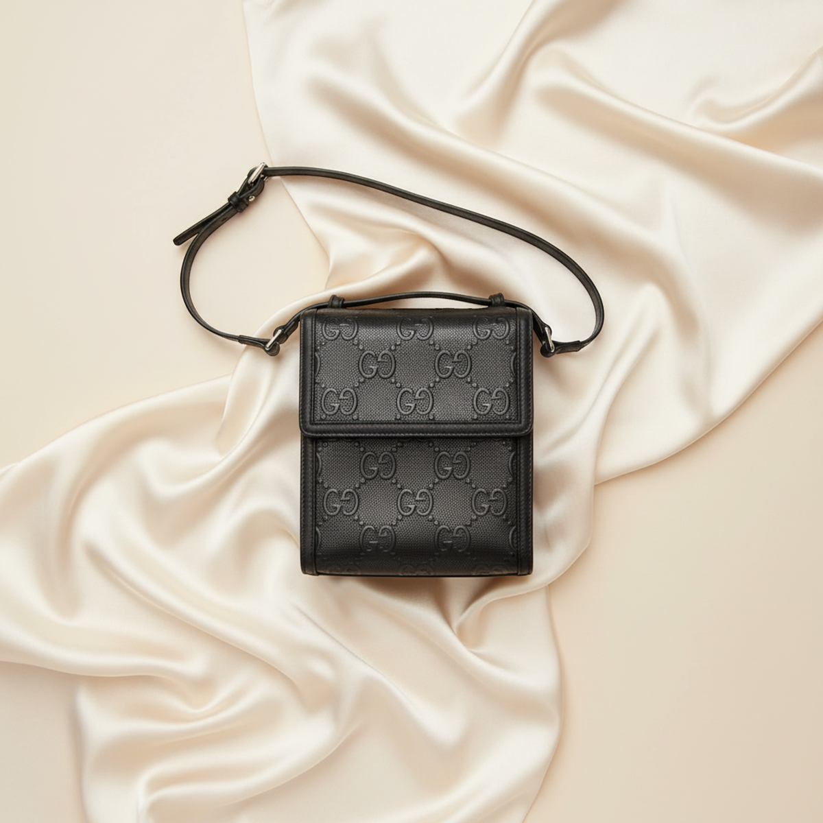Gucci GG Embossed Crossbody · Leather