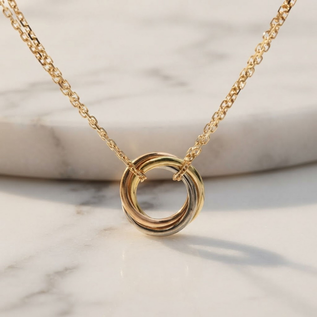 Cartier Baby Trinity · Tri-Gold