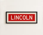 Framed Lincoln Bus Scroll