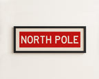 Framed North Pole Red Christmas Art Print