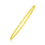 14k Yellow Gold Thin Twisted Shiny Bangle
