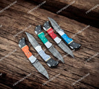 Handcrafted Damascus Steel Folding Knife – Vibrant Inlay Handle